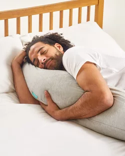 Use a soft mattress or a body pillow